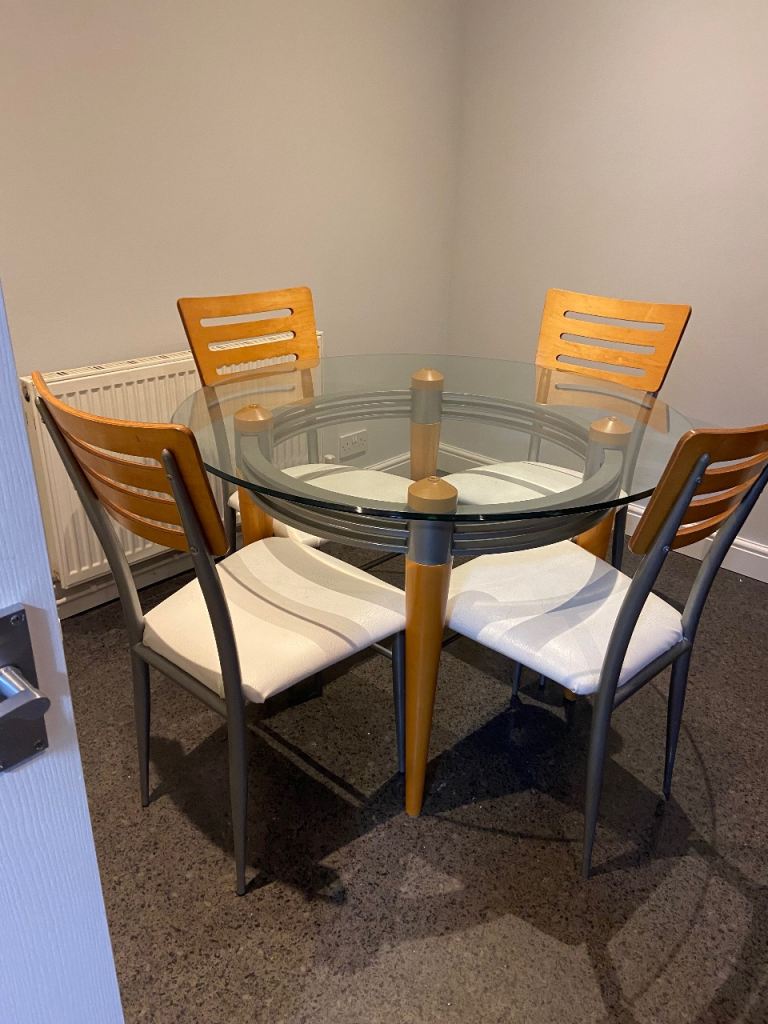 Round glass table and 4 chairs