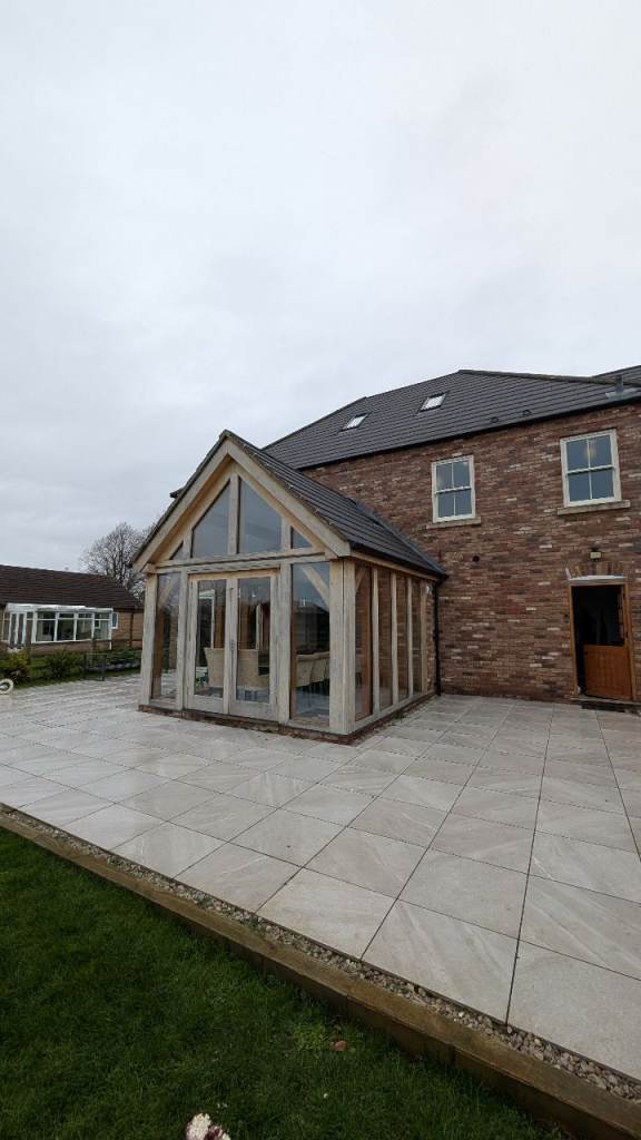 Solid oak framed double glazed conservatory, including two veluxes