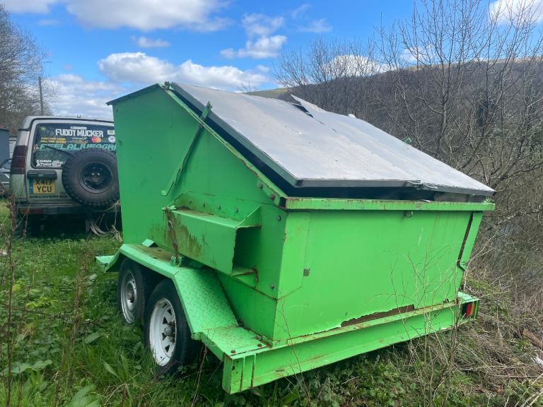 Mobile skip trailers tow a skip