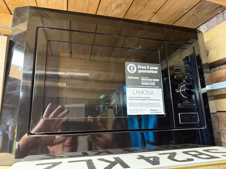 Brand new howdens microwave integrated oven
