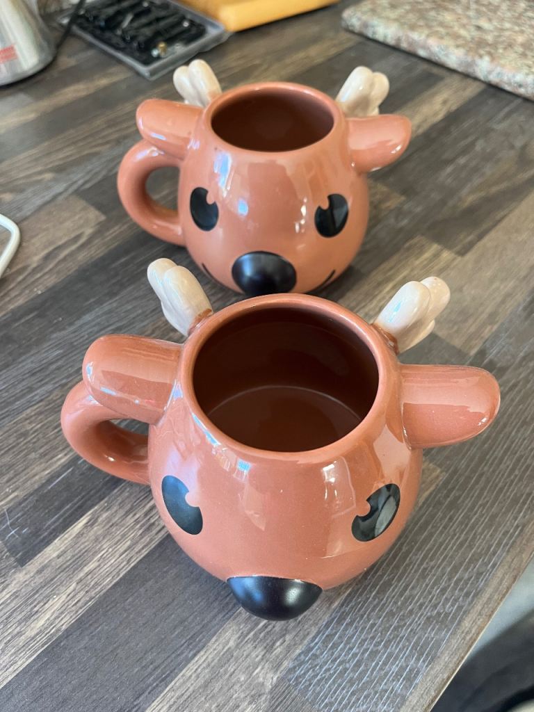 Rudolph mugs x 2 with colour changing nose. New. £10 for both
