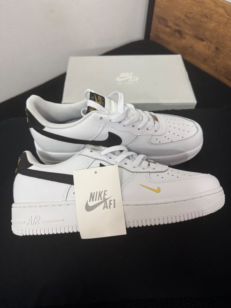 Brand New, Nike Air Force 1’s, Black & Gold.  Size 9.