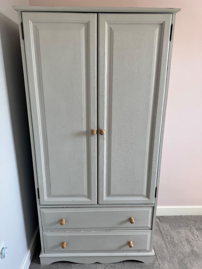 Solid pine wardrobe, painted warm grey on the outside, and turquoise inside. Good used condition 