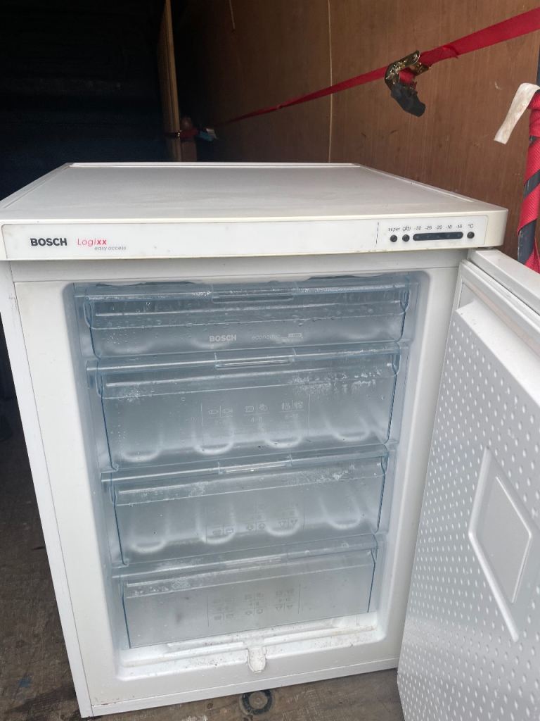 Bosch freezer with several clear drawers, ideal for extra food storage.