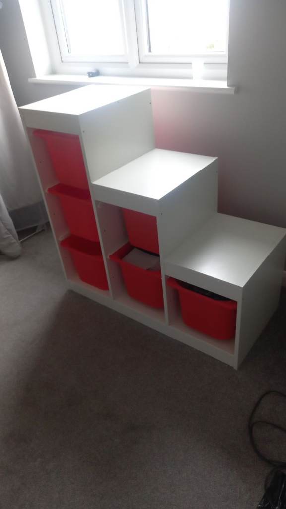Ikea white trofast unit with 6 orange boxes 