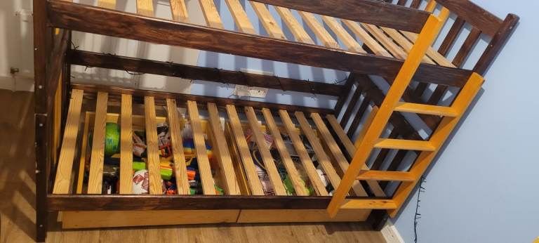 Wooden bunk bed.