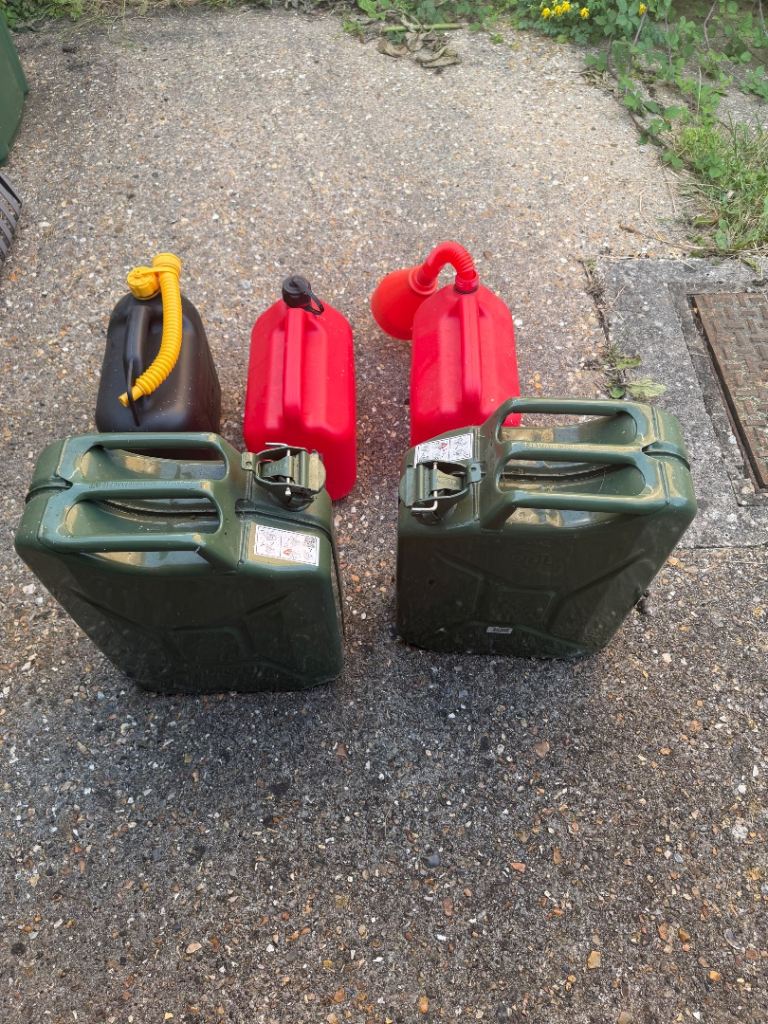 Petrol cans with funnel