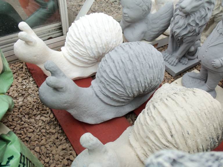 Concrete stone garden ornament statue of a snail