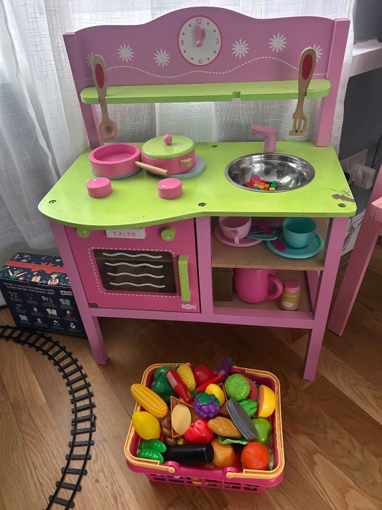 image for Play kitchen lots of supplies included 