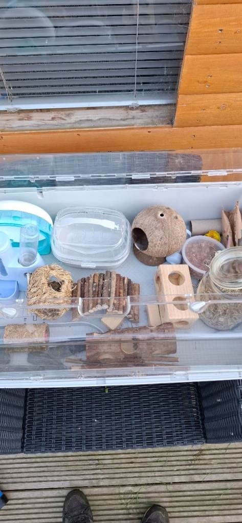 Small pet cage with some accessories 