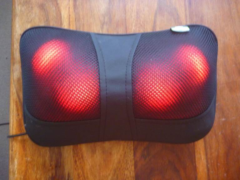 Motorised & heated massager with manual