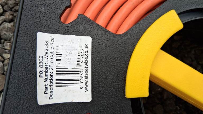 25 metre mains electric hook up cable on reel.