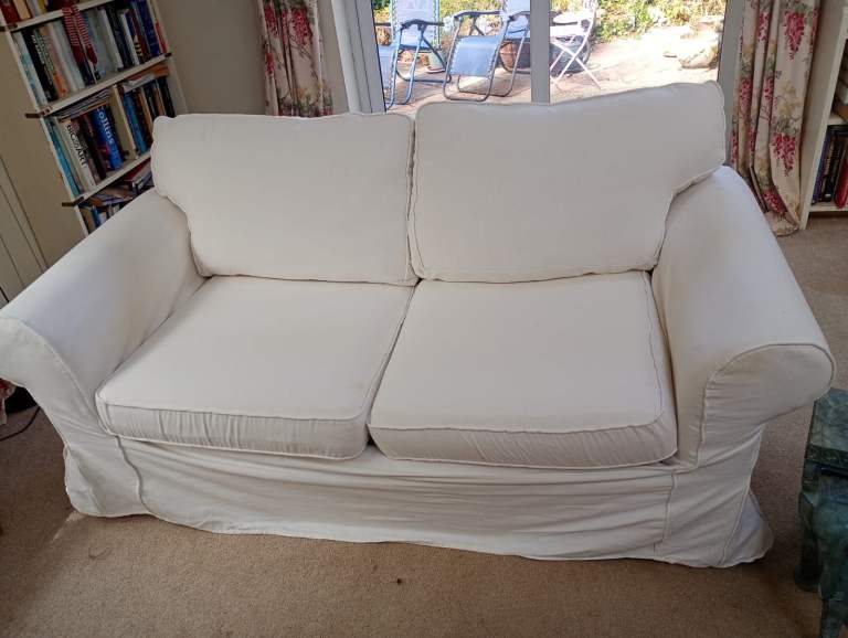 Cream Two-Seater Sofa with Washable Covers – Good Condition