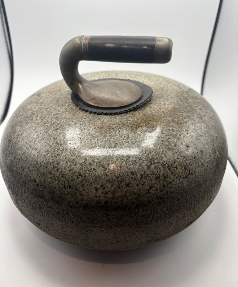 Selection of granite curling stones. Some still usable and others as great door stops!