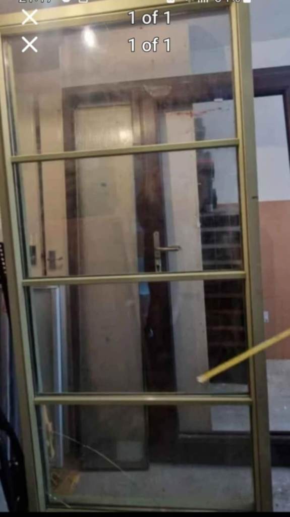 Green wooden solid window