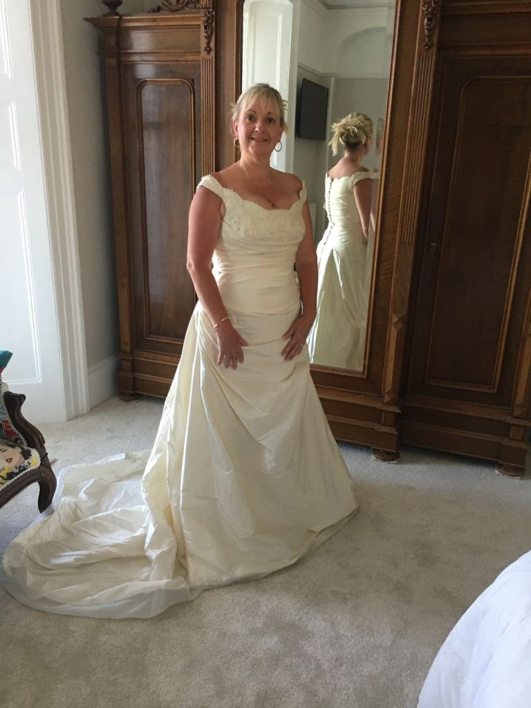 Pronovais wedding dress unworn .