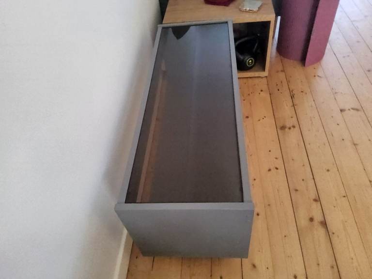 Glass-topped coffee table 