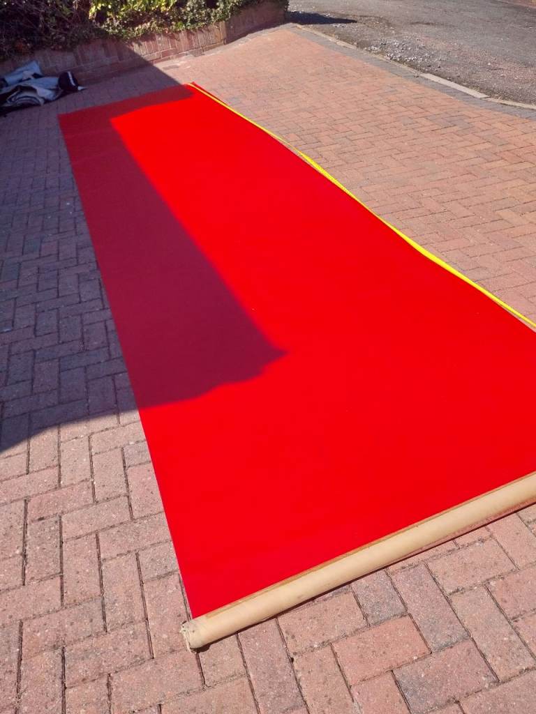 Vinyl upholstery material bright red. 1.5mX5.8m