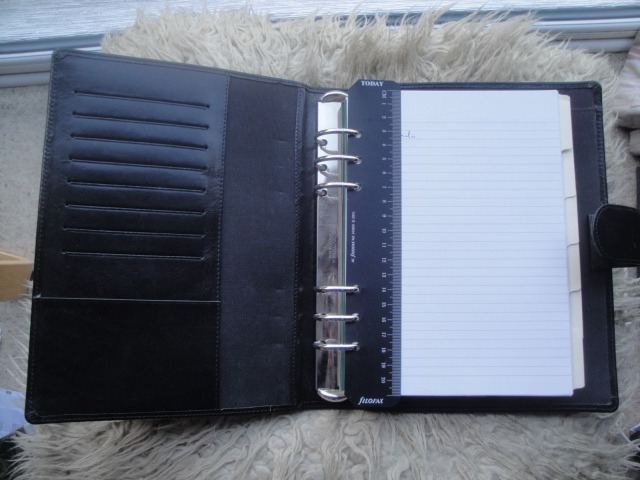 Filofax Type  A5 size Black Cover and Various Filofax and other contents. 
