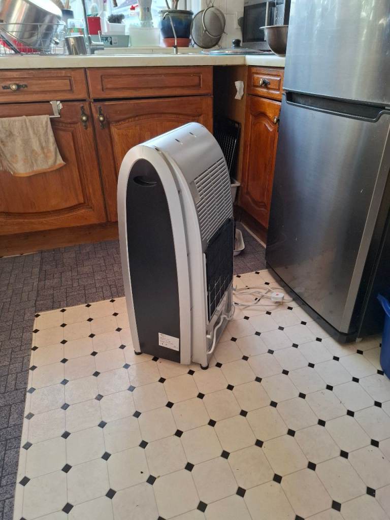 SLUM AIR EVAPORATIVE COOLER