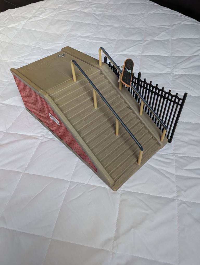 Tech deck stair ramp