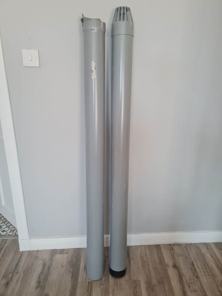 Pair of Grey Plastic Pipes with Vent Cap
