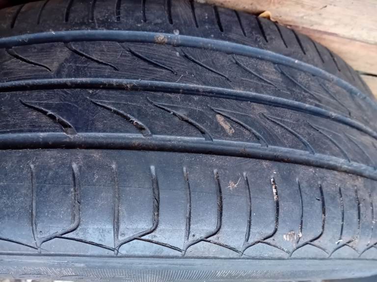 Metal wheels and tyres with genuine fiat wheel trims.