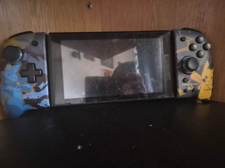 Nintendo Switch with Custom Pikachu Joy-Cons – Good Condition