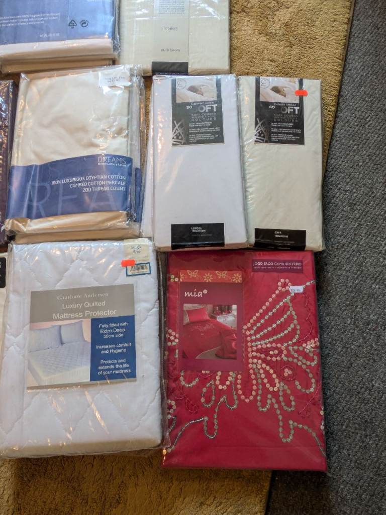 Brand new duvet covers and bed sheets