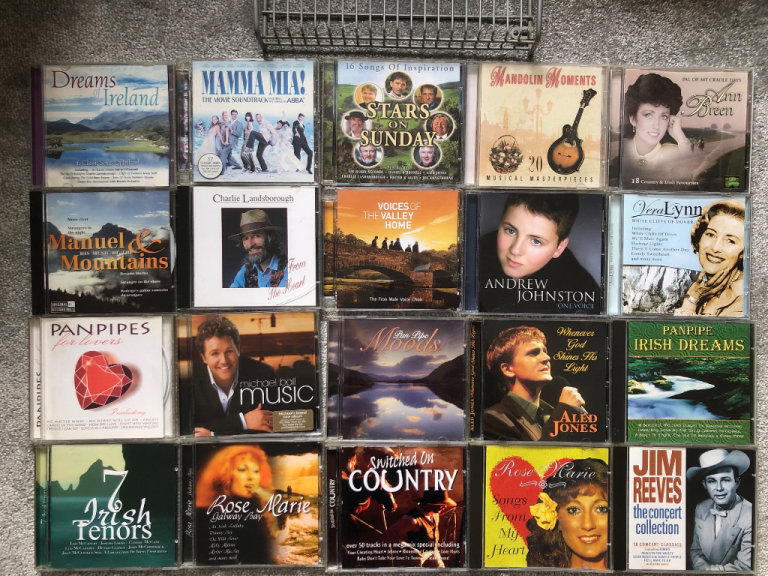 43 Misc CDs & 20 CD rack; Mamma Mia, Jim Reeves, Vera Lynn, Aled Jones, Rod Stewart, panpipes, etc