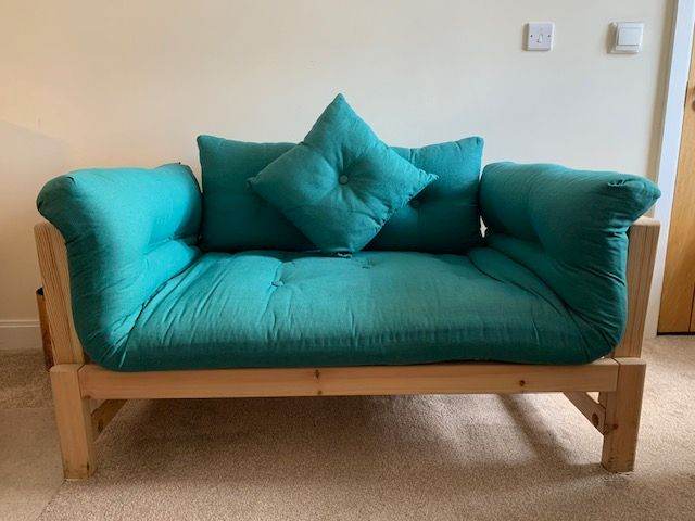 Solid Pine Futon Sofa Bed with Teal Cushions – As good as new Condition