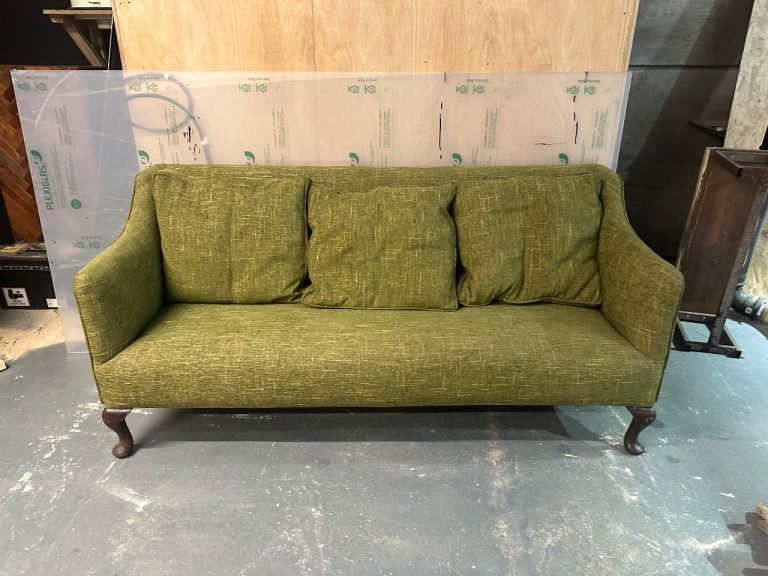 Green fabric sofa 