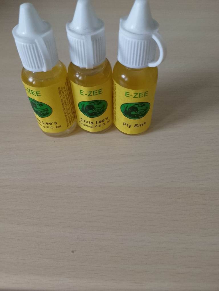 Two bottles of Fly Fishing CDC (culdie) oil and one of fly/leader sinkant