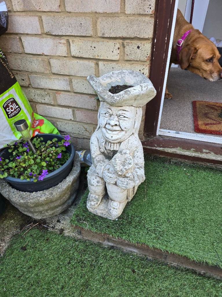 Toby jugs in concrete