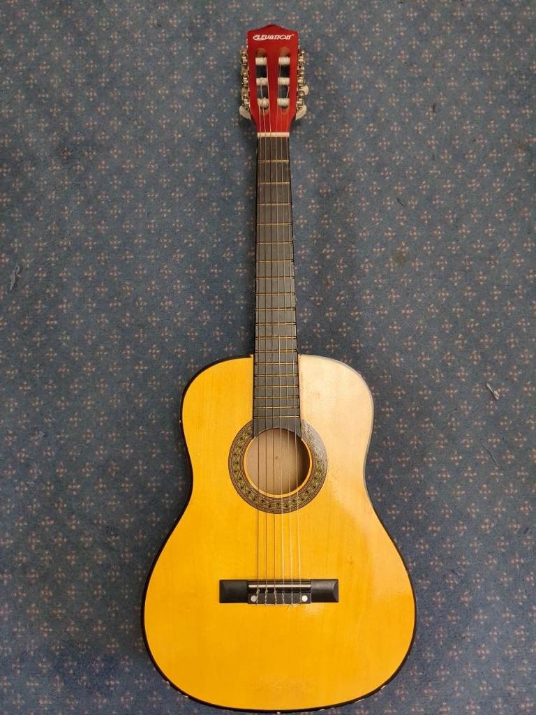 Child's 1/2 size, Elevation Acoustic Guitar – Good Condition