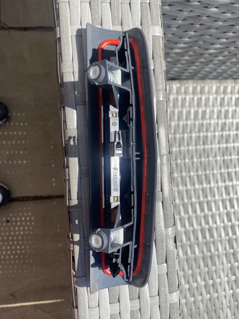 Corsa e rear tailgate stop light with built in washer