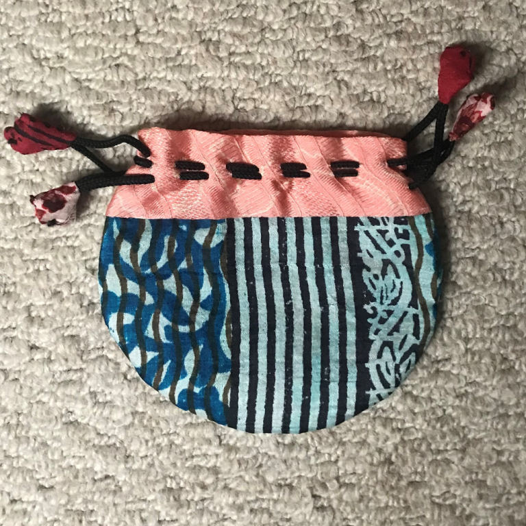 New, unsused silky fabric, drawstring bag, pouch, purse. Lined, double-sided design Can post.