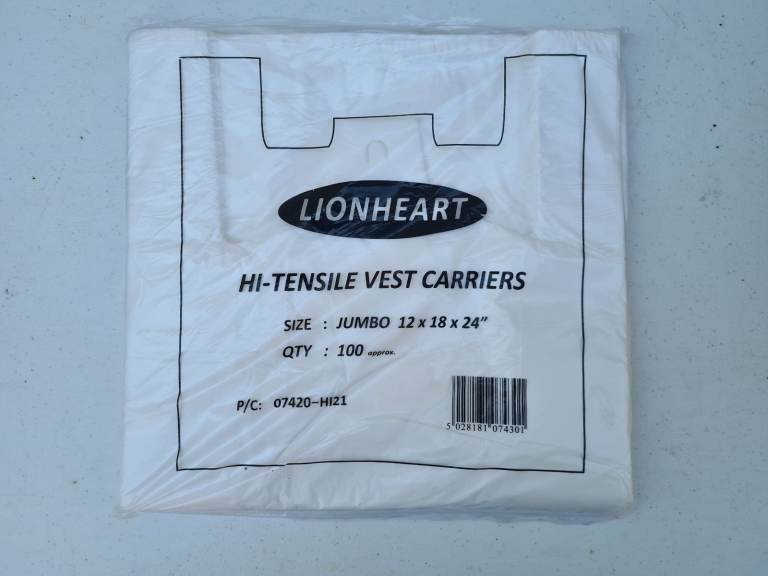 Pack of 100 White Vest Style Carrier Bags 12" x 18" x 24". New and sealed
