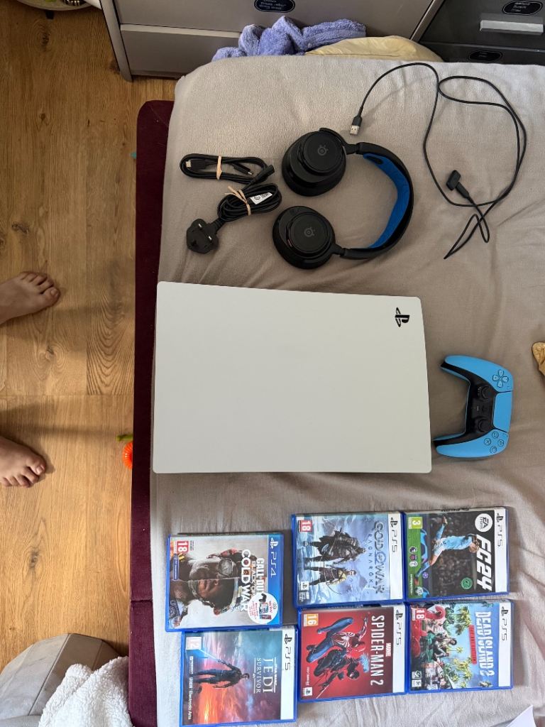 Sony PlayStation 5 Console 1TB with Controller, Headset, and 6 Games