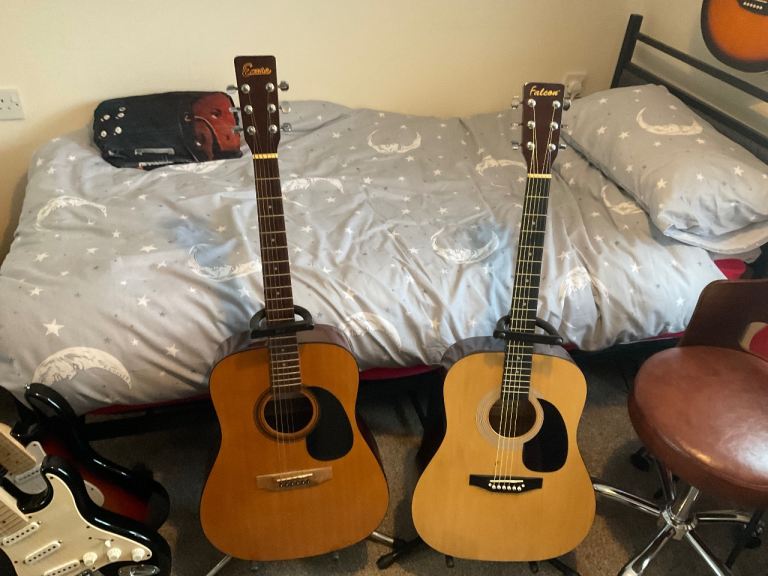 Two Acoustic Guitars - Encore  electro acoustic guitar and a Falcon acoustic guitar Good Condition