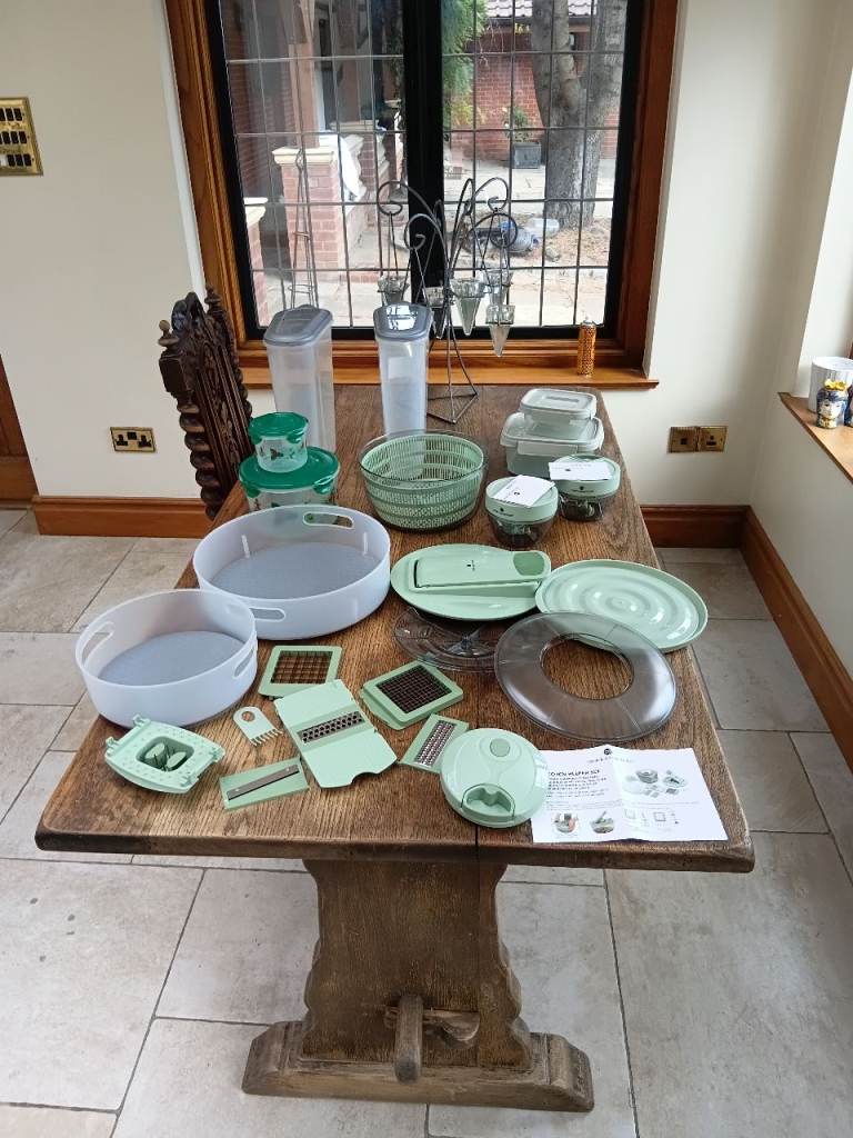 Large Set of Green Kitchen Gadgets and Storage Containers