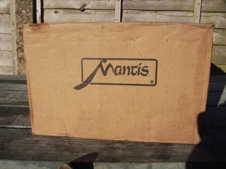 Mantis box with unused Lawn care kit comprising Scarifier and guards, Edger and Lawn aerator tines