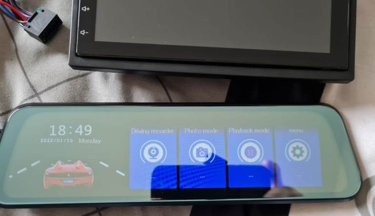 Multi media touch screen head unit with front and rear cameras