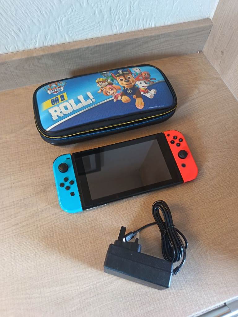 Nintendo Switch + Case and Charger