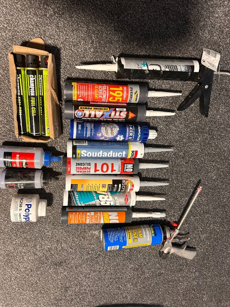 JOB LOT: Sealants, silicone, solvent cement, chalk, resin - includes Caulking and Foam cleaner gun