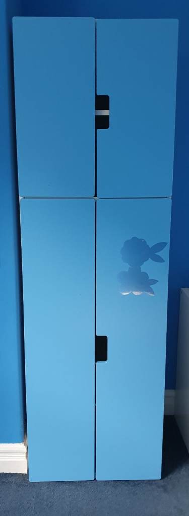 Blue Four-Door Storage Wardrobe – Good Condition