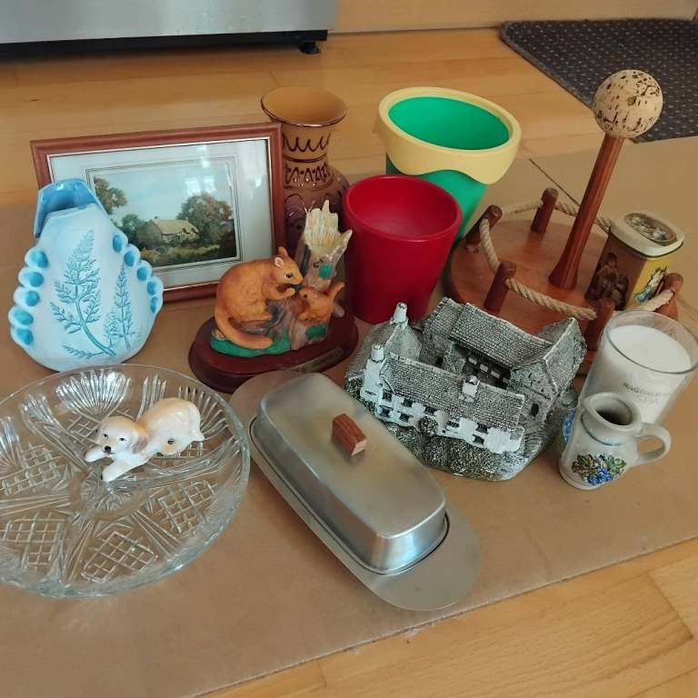 Boxes of various items incl. ornaments, vases, books, LPs etc.  £10 per box