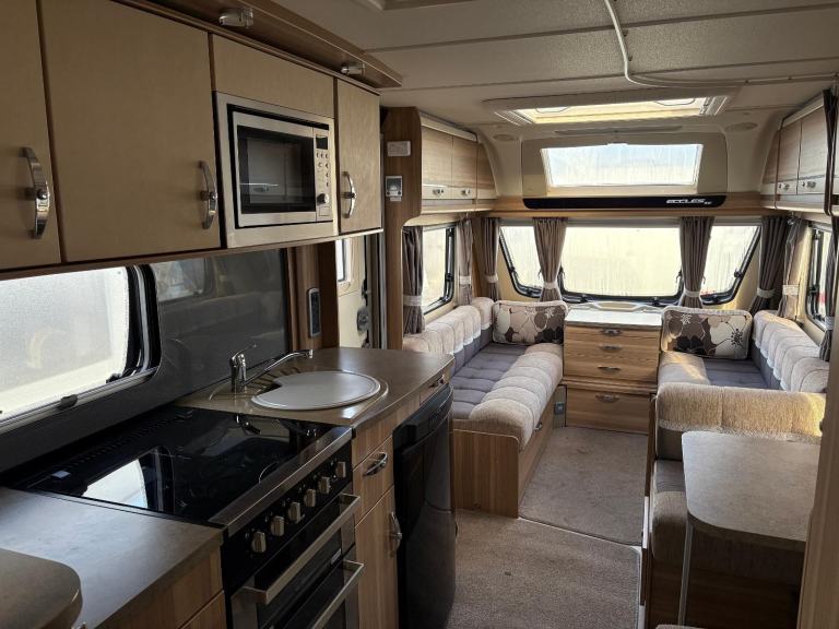 STERLING ECCLES AMETHYST -TWIN AXLE- FIXED BED + SIDE DINETTE + MOTORMOVER