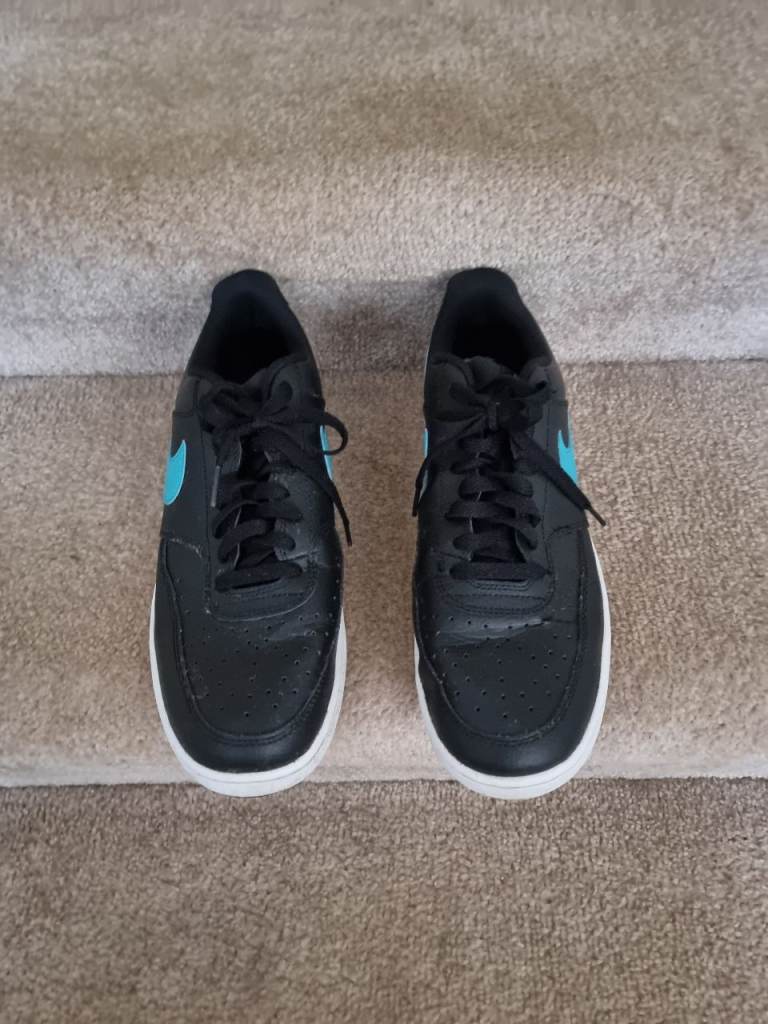 Nike Black Trainers with Blue Detail – Good Condition