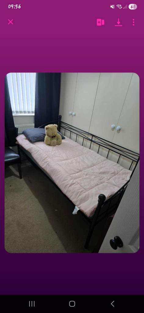 Day bed with trundle bed underneath with mattresses 